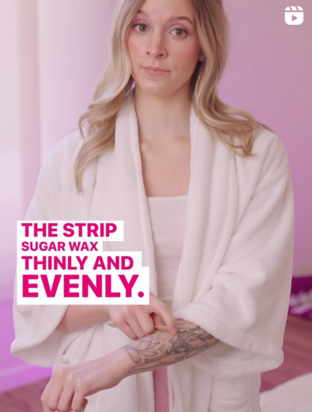 Woman in a white robe with text about Kiss waxing strip sugar application on a pink background
