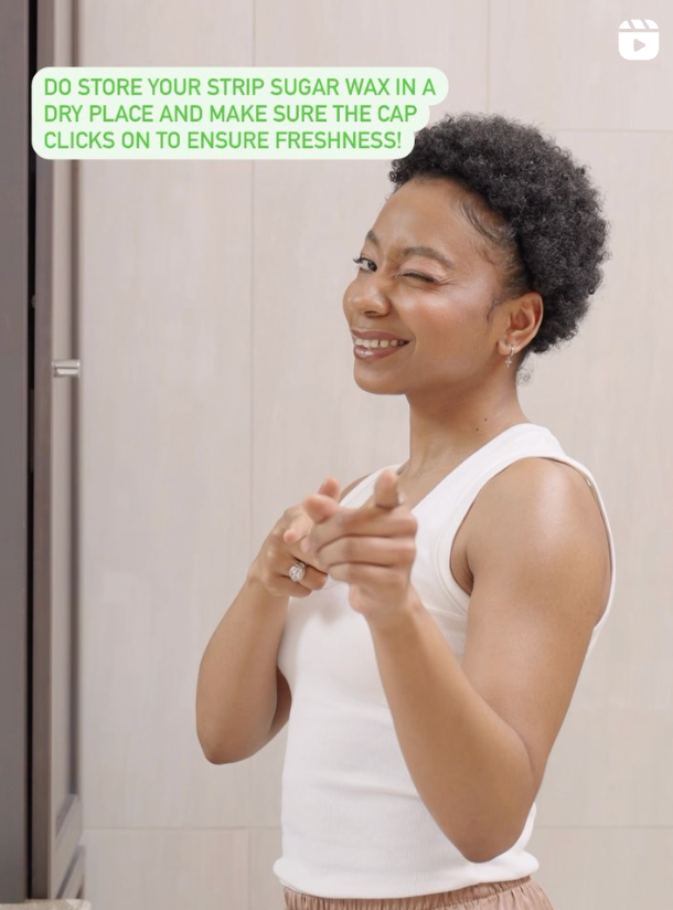 Woman winking at the camera with text about story strip sugar waxing in dry place with cap secure