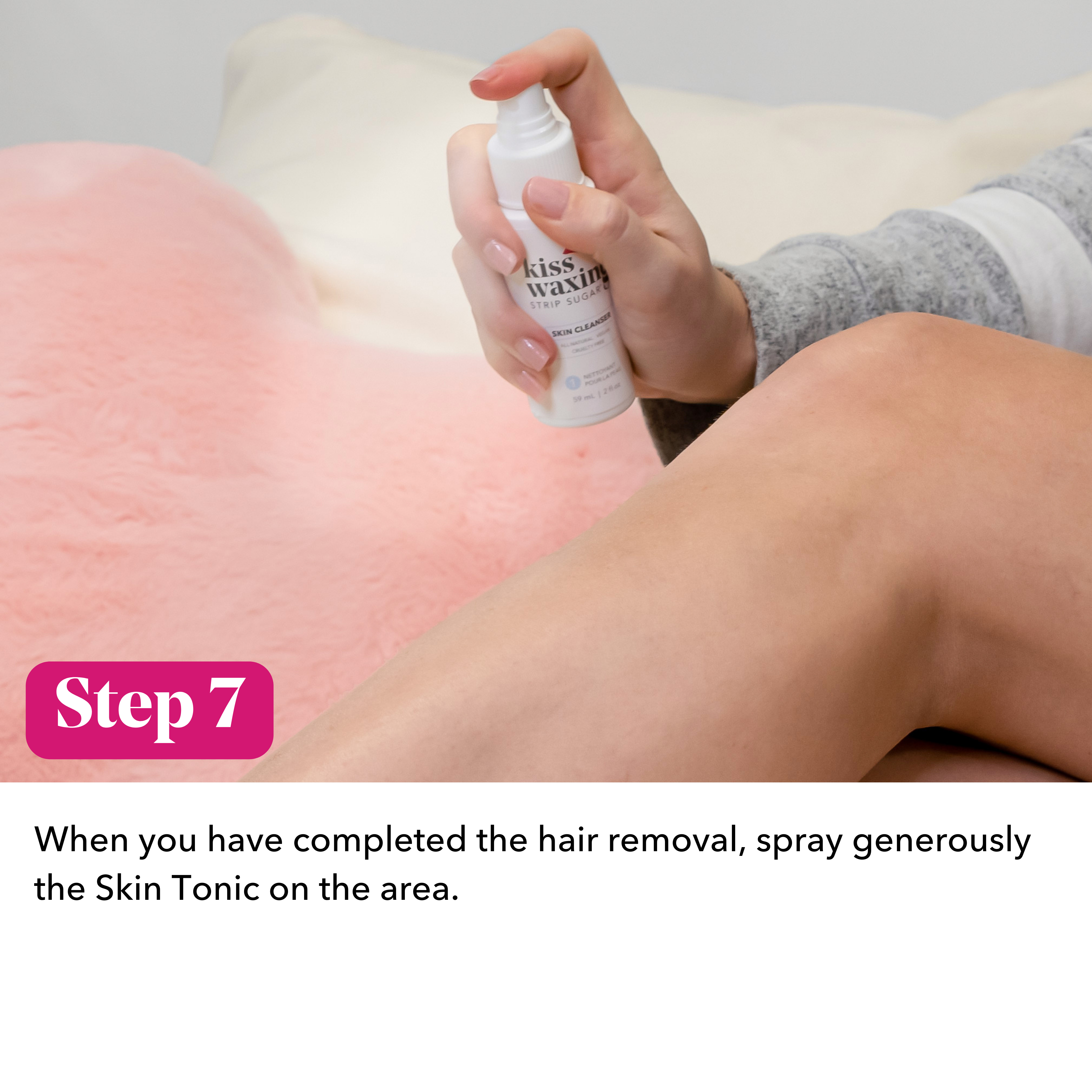 Person using a bottle labeled 'kiss waxing skin tonic' on their leg with text indicating "step 7 when you have completed the hair removal, spray generously the skin tonic on the area"